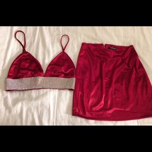 Red satin bralette with rhinestones and mini skirt